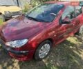 Красный Пежо 206, объемом двигателя 1.36 л и пробегом 133 тыс. км за 4200 $, фото 7 на Automoto.ua