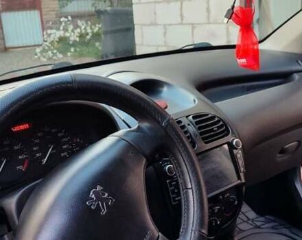 Червоний Пежо 206, об'ємом двигуна 1.4 л та пробігом 204 тис. км за 2850 $, фото 6 на Automoto.ua