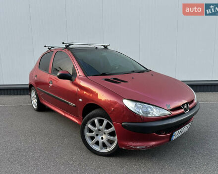 Красный Пежо 206, объемом двигателя 1.4 л и пробегом 263 тыс. км за 2600 $, фото 1 на Automoto.ua