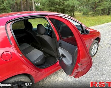 Красный Пежо 206, объемом двигателя 1.4 л и пробегом 175 тыс. км за 3650 $, фото 5 на Automoto.ua
