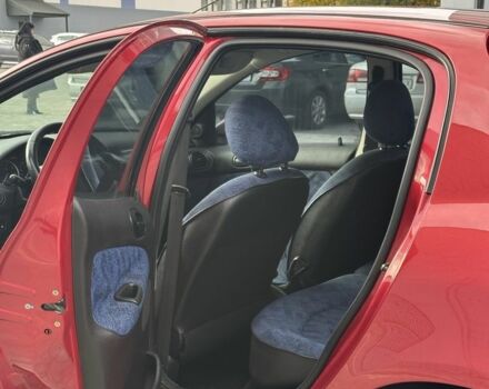 Красный Пежо 206, объемом двигателя 1.6 л и пробегом 195 тыс. км за 3750 $, фото 17 на Automoto.ua