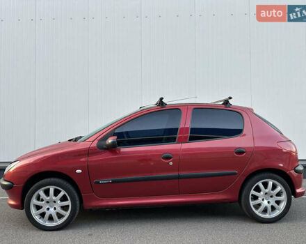 Красный Пежо 206, объемом двигателя 1.4 л и пробегом 263 тыс. км за 2600 $, фото 2 на Automoto.ua