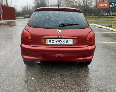 Красный Пежо 206, объемом двигателя 1.59 л и пробегом 269 тыс. км за 3900 $, фото 3 на Automoto.ua