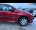 Красный Пежо 206, объемом двигателя 1.4 л и пробегом 259 тыс. км за 2600 $, фото 13 на Automoto.ua