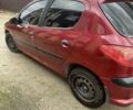 Красный Пежо 206, объемом двигателя 1.4 л и пробегом 182 тыс. км за 4000 $, фото 4 на Automoto.ua