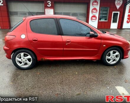 Красный Пежо 206, объемом двигателя 1.6 л и пробегом 269 тыс. км за 3900 $, фото 2 на Automoto.ua