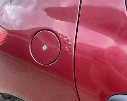 Красный Пежо 206, объемом двигателя 1.36 л и пробегом 181 тыс. км за 3900 $, фото 4 на Automoto.ua