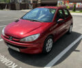 Червоний Пежо 206, об'ємом двигуна 1.36 л та пробігом 268 тис. км за 3500 $, фото 1 на Automoto.ua