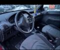 Красный Пежо 206, объемом двигателя 1.4 л и пробегом 259 тыс. км за 2600 $, фото 8 на Automoto.ua