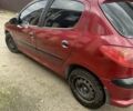 Красный Пежо 206, объемом двигателя 1.36 л и пробегом 181 тыс. км за 3900 $, фото 5 на Automoto.ua