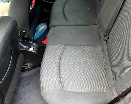 Красный Пежо 206, объемом двигателя 1.6 л и пробегом 269 тыс. км за 3900 $, фото 5 на Automoto.ua