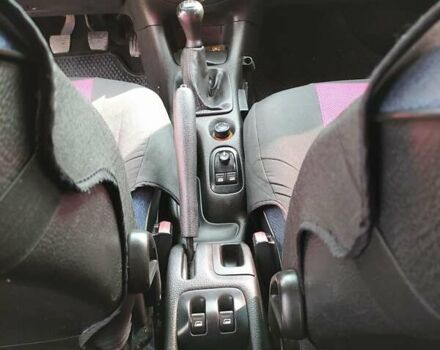 Красный Пежо 206, объемом двигателя 1.4 л и пробегом 177 тыс. км за 3400 $, фото 4 на Automoto.ua