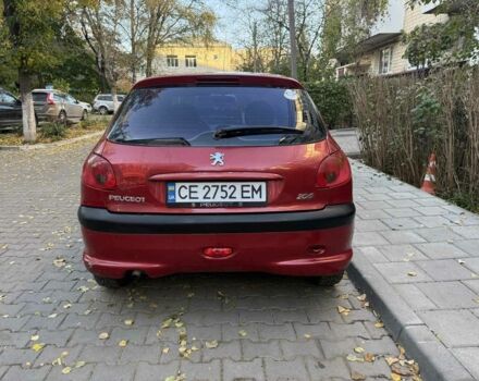 Красный Пежо 206, объемом двигателя 1.4 л и пробегом 171 тыс. км за 3200 $, фото 5 на Automoto.ua