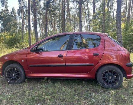 Красный Пежо 206, объемом двигателя 1.4 л и пробегом 360 тыс. км за 3100 $, фото 2 на Automoto.ua