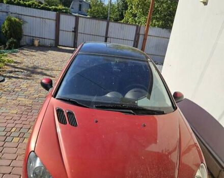 Красный Пежо 206, объемом двигателя 1.36 л и пробегом 131 тыс. км за 4800 $, фото 1 на Automoto.ua