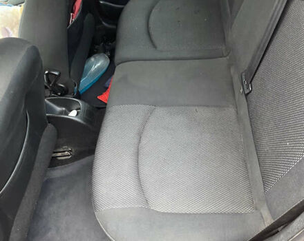 Красный Пежо 206, объемом двигателя 1.59 л и пробегом 269 тыс. км за 3900 $, фото 6 на Automoto.ua