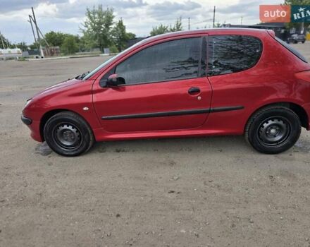Червоний Пежо 206, об'ємом двигуна 1.4 л та пробігом 260 тис. км за 3130 $, фото 7 на Automoto.ua