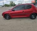 Червоний Пежо 206, об'ємом двигуна 1.4 л та пробігом 260 тис. км за 3130 $, фото 7 на Automoto.ua