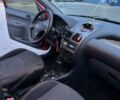 Красный Пежо 206, объемом двигателя 1.4 л и пробегом 229 тыс. км за 3500 $, фото 8 на Automoto.ua