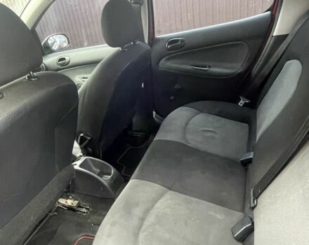 Красный Пежо 206, объемом двигателя 1.4 л и пробегом 182 тыс. км за 4000 $, фото 3 на Automoto.ua