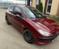 Красный Пежо 206, объемом двигателя 1.4 л и пробегом 182 тыс. км за 4000 $, фото 1 на Automoto.ua