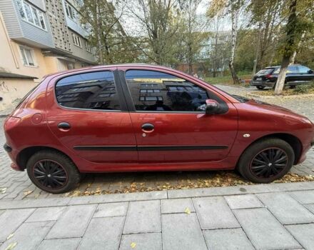 Красный Пежо 206, объемом двигателя 1.4 л и пробегом 171 тыс. км за 3200 $, фото 2 на Automoto.ua