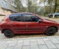 Красный Пежо 206, объемом двигателя 1.4 л и пробегом 171 тыс. км за 3200 $, фото 2 на Automoto.ua