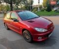 Красный Пежо 206, объемом двигателя 1.4 л и пробегом 228 тыс. км за 2800 $, фото 7 на Automoto.ua