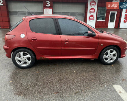 Красный Пежо 206, объемом двигателя 1.59 л и пробегом 269 тыс. км за 3900 $, фото 2 на Automoto.ua