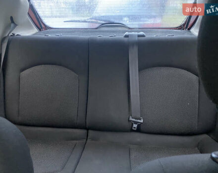 Красный Пежо 206, объемом двигателя 1.59 л и пробегом 269 тыс. км за 3900 $, фото 5 на Automoto.ua