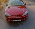 Красный Пежо 206, объемом двигателя 1.4 л и пробегом 228 тыс. км за 2800 $, фото 1 на Automoto.ua
