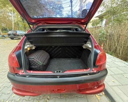 Красный Пежо 206, объемом двигателя 1.4 л и пробегом 171 тыс. км за 3200 $, фото 8 на Automoto.ua