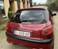 Красный Пежо 206, объемом двигателя 1.4 л и пробегом 182 тыс. км за 4000 $, фото 7 на Automoto.ua