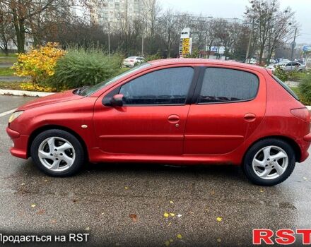 Красный Пежо 206, объемом двигателя 1.6 л и пробегом 269 тыс. км за 3900 $, фото 1 на Automoto.ua