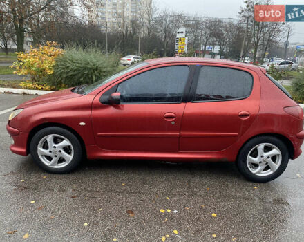 Красный Пежо 206, объемом двигателя 1.59 л и пробегом 269 тыс. км за 3900 $, фото 1 на Automoto.ua
