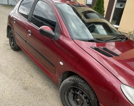 Красный Пежо 206, объемом двигателя 1.36 л и пробегом 181 тыс. км за 3900 $, фото 9 на Automoto.ua
