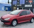 Красный Пежо 206, объемом двигателя 1.4 л и пробегом 229 тыс. км за 3500 $, фото 2 на Automoto.ua