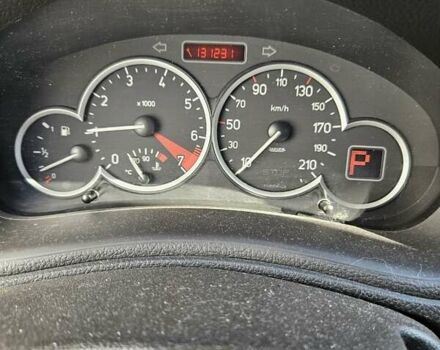 Красный Пежо 206, объемом двигателя 1.36 л и пробегом 131 тыс. км за 4800 $, фото 8 на Automoto.ua