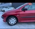 Красный Пежо 206, объемом двигателя 1.4 л и пробегом 259 тыс. км за 2600 $, фото 18 на Automoto.ua