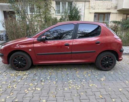 Красный Пежо 206, объемом двигателя 1.4 л и пробегом 171 тыс. км за 3200 $, фото 7 на Automoto.ua