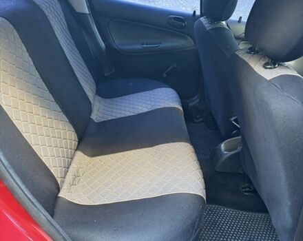 Красный Пежо 206, объемом двигателя 1.4 л и пробегом 171 тыс. км за 3200 $, фото 3 на Automoto.ua