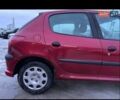Красный Пежо 206, объемом двигателя 1.4 л и пробегом 259 тыс. км за 2600 $, фото 15 на Automoto.ua