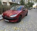 Красный Пежо 206, объемом двигателя 1.4 л и пробегом 171 тыс. км за 3200 $, фото 1 на Automoto.ua