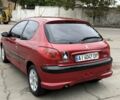 Красный Пежо 206, объемом двигателя 1.4 л и пробегом 203 тыс. км за 3500 $, фото 2 на Automoto.ua