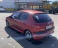 Красный Пежо 206, объемом двигателя 1.4 л и пробегом 200 тыс. км за 3600 $, фото 4 на Automoto.ua