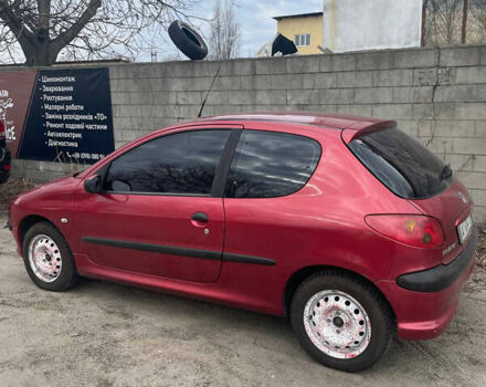 Красный Пежо 206, объемом двигателя 1.4 л и пробегом 200 тыс. км за 3100 $, фото 3 на Automoto.ua
