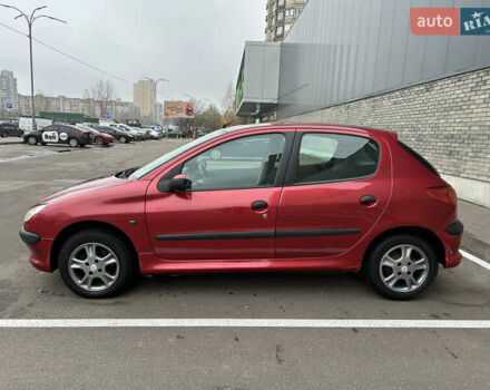 Красный Пежо 206, объемом двигателя 1.4 л и пробегом 76 тыс. км за 5200 $, фото 5 на Automoto.ua
