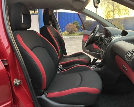 Красный Пежо 206, объемом двигателя 1.4 л и пробегом 119 тыс. км за 4500 $, фото 11 на Automoto.ua