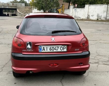 Красный Пежо 206, объемом двигателя 1.4 л и пробегом 203 тыс. км за 3500 $, фото 3 на Automoto.ua