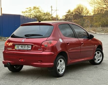 Красный Пежо 206, объемом двигателя 1.4 л и пробегом 119 тыс. км за 4500 $, фото 1 на Automoto.ua